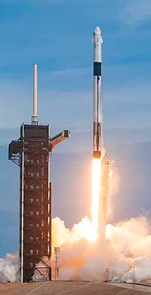 A SpaceX Falcon 9 rocket Lifts off from Launch Pad 39A At Kennedy Space Center
